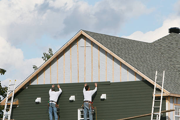 Professional Siding technician working in West Springfield, PA